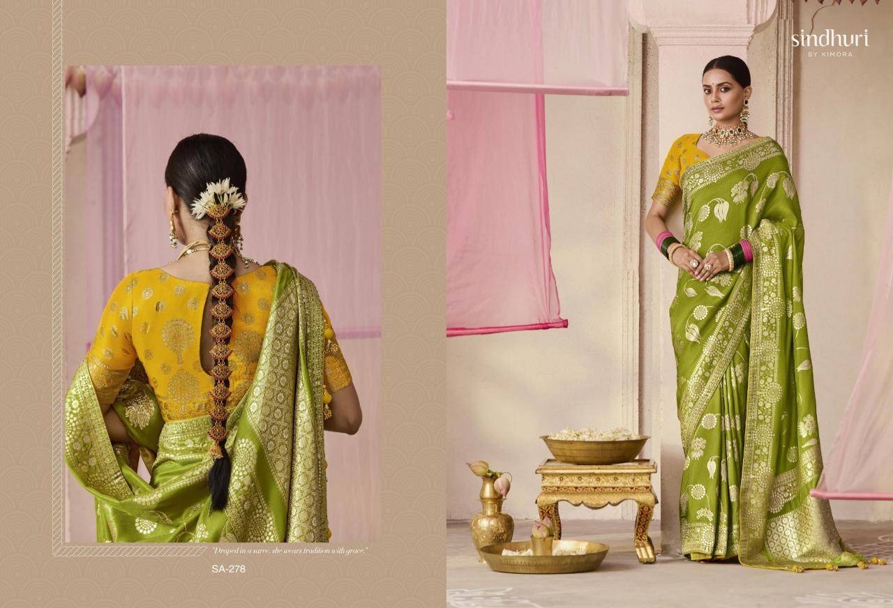 Kimora premika onam special dola silkSaree suppliers in Ahmedabad