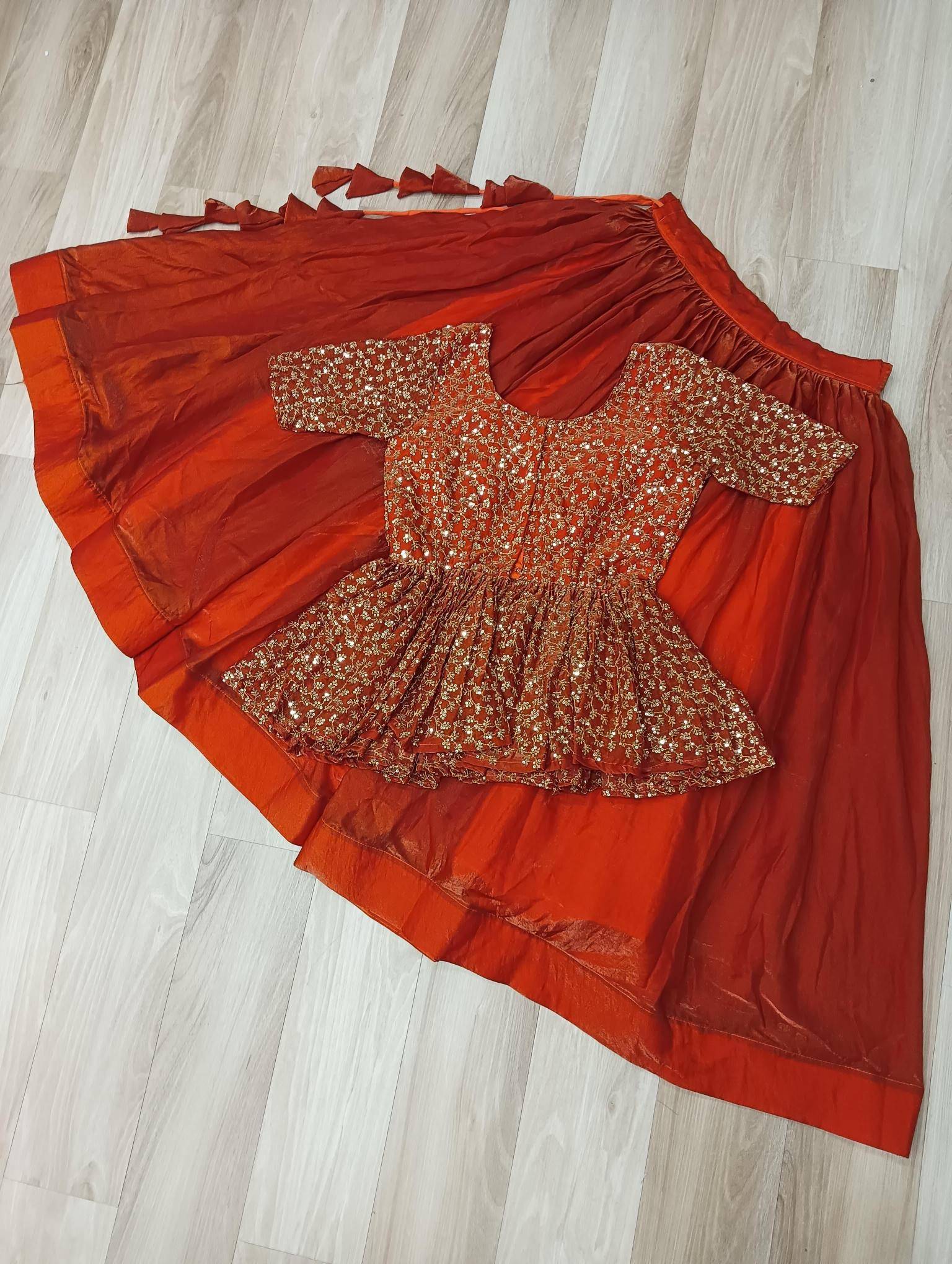 Premium LW-7137 Fendy Orange Latest lehenga choli designs in Ahmedabad