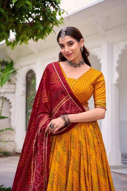 N BANDHANI Tussar Silk Yellow  Lehenga choli suppliers in Mumbai