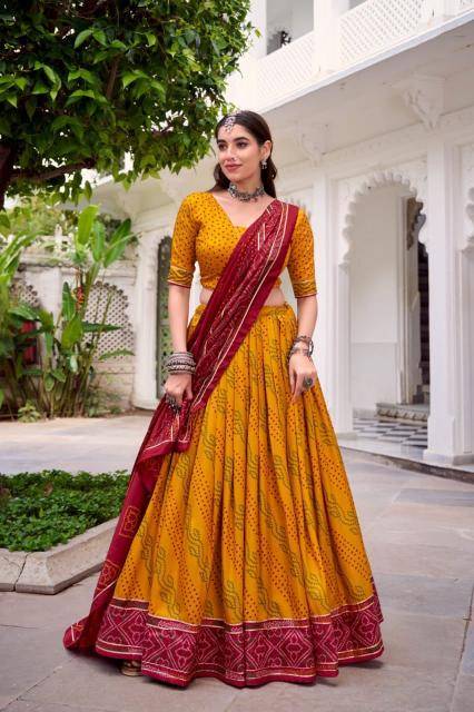 N BANDHANI Tussar Silk Yellow  Lehenga choli suppliers in Mumbai