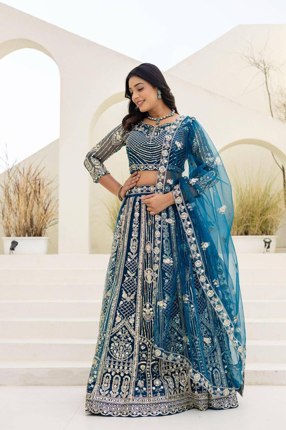 Royal elegance ON 5164 Butterfly Net Blue Lehengha choli Suppliers in Ahmedabad