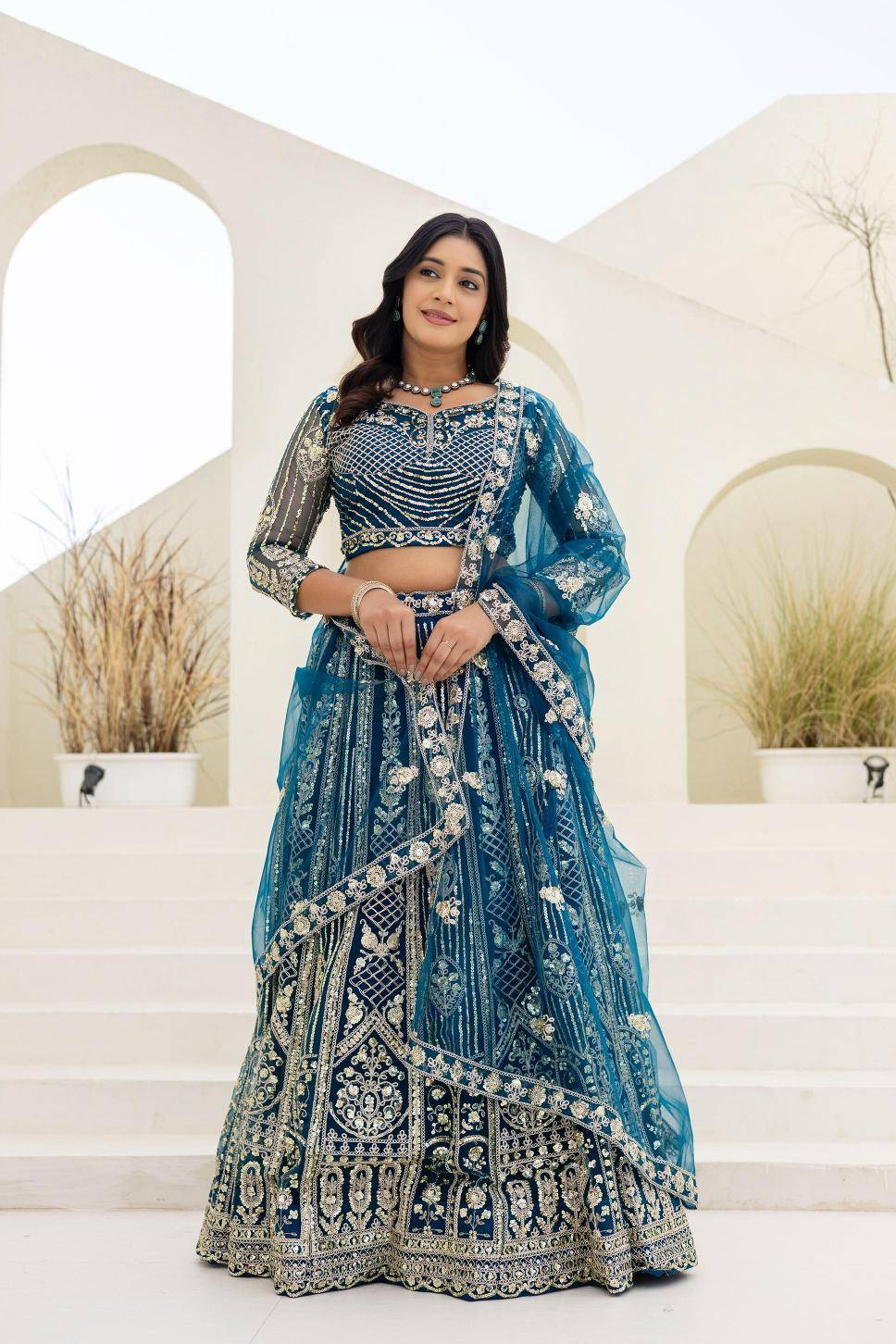 Royal elegance ON 5164 Butterfly Net Blue Lehengha choli Suppliers in Ahmedabad