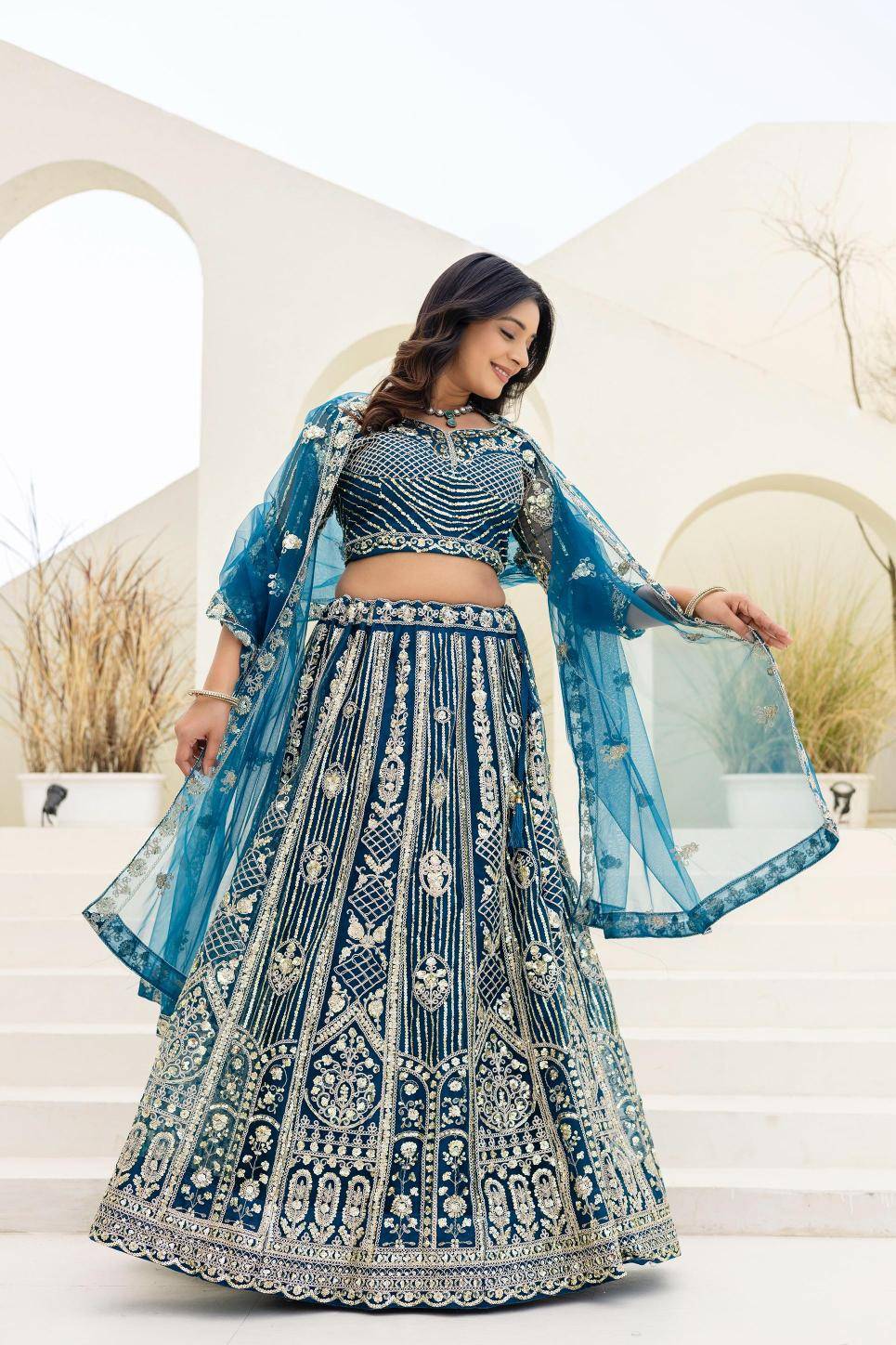 Royal elegance ON 5164 Butterfly Net Blue Lehengha choli Suppliers in Ahmedabad