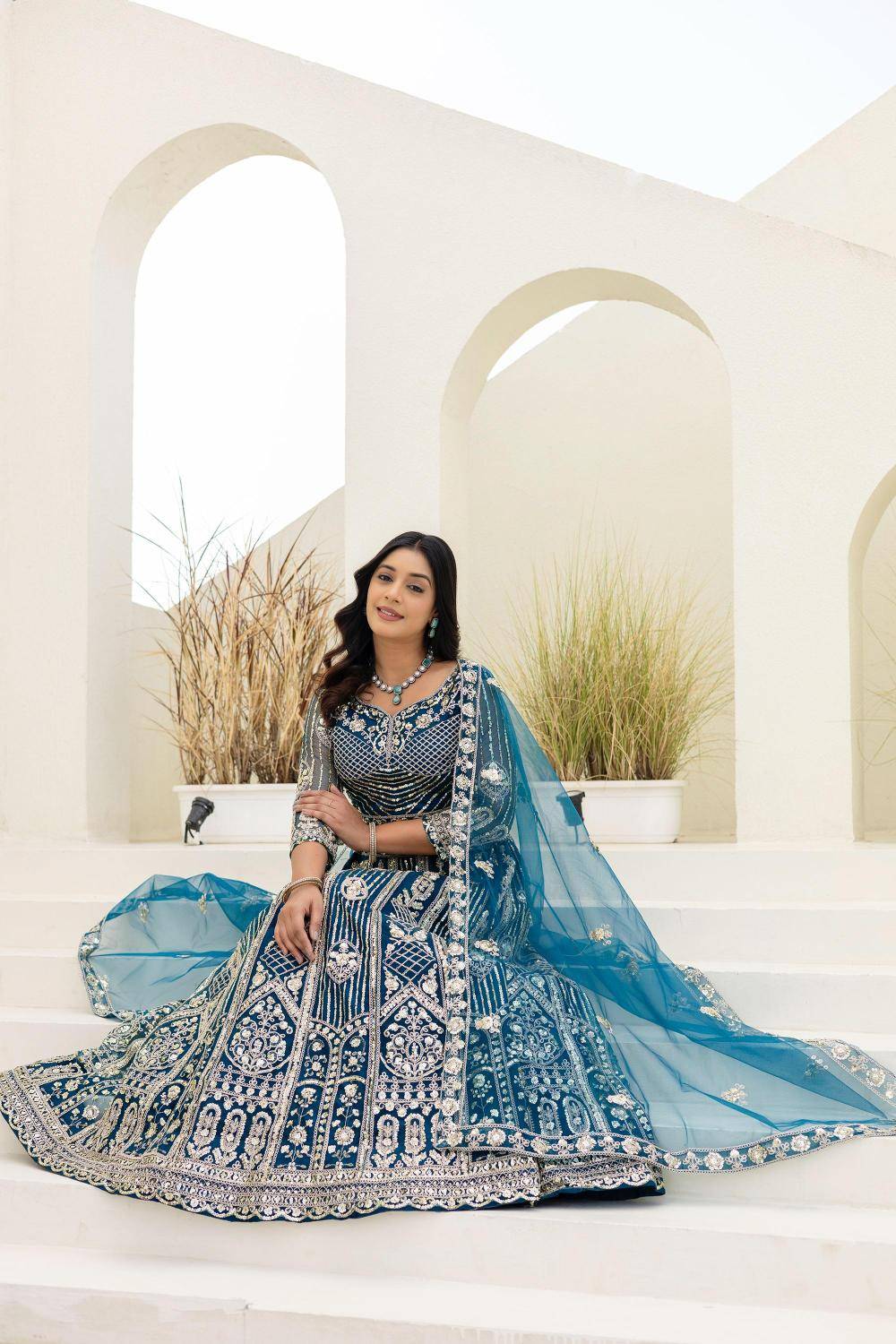 Royal elegance ON 5164 Butterfly Net Blue Lehengha choli Suppliers in Ahmedabad