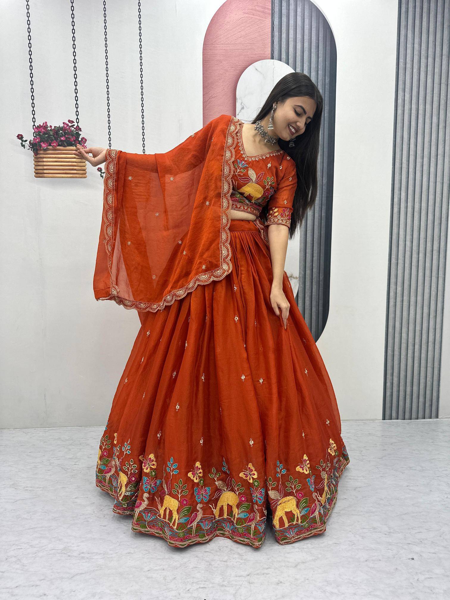 Tapi-303 shimar Orange Embroidered lehenga choli wholesalers in Gujarat