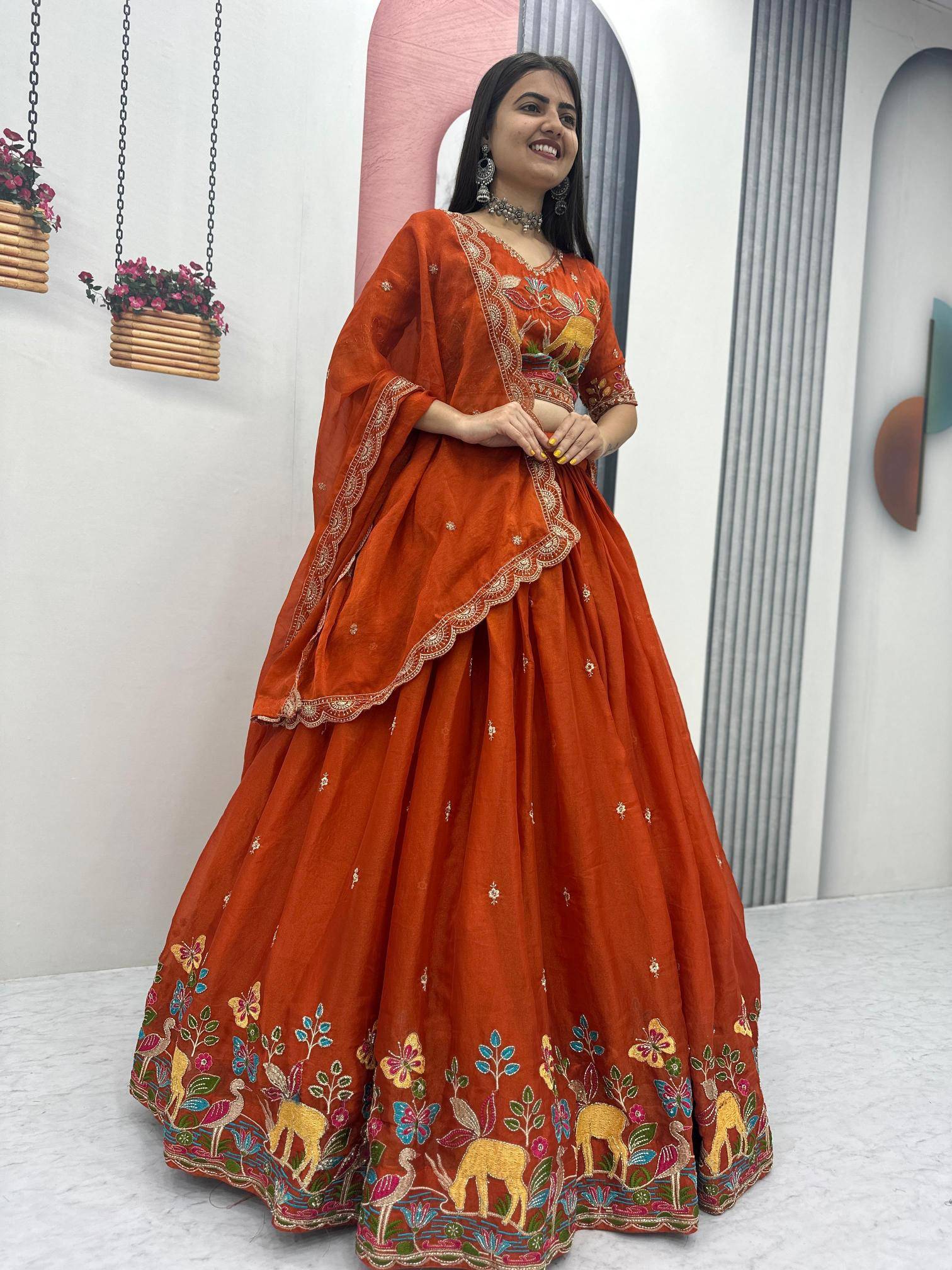 Tapi-303 shimar Orange Embroidered lehenga choli wholesalers in Gujarat