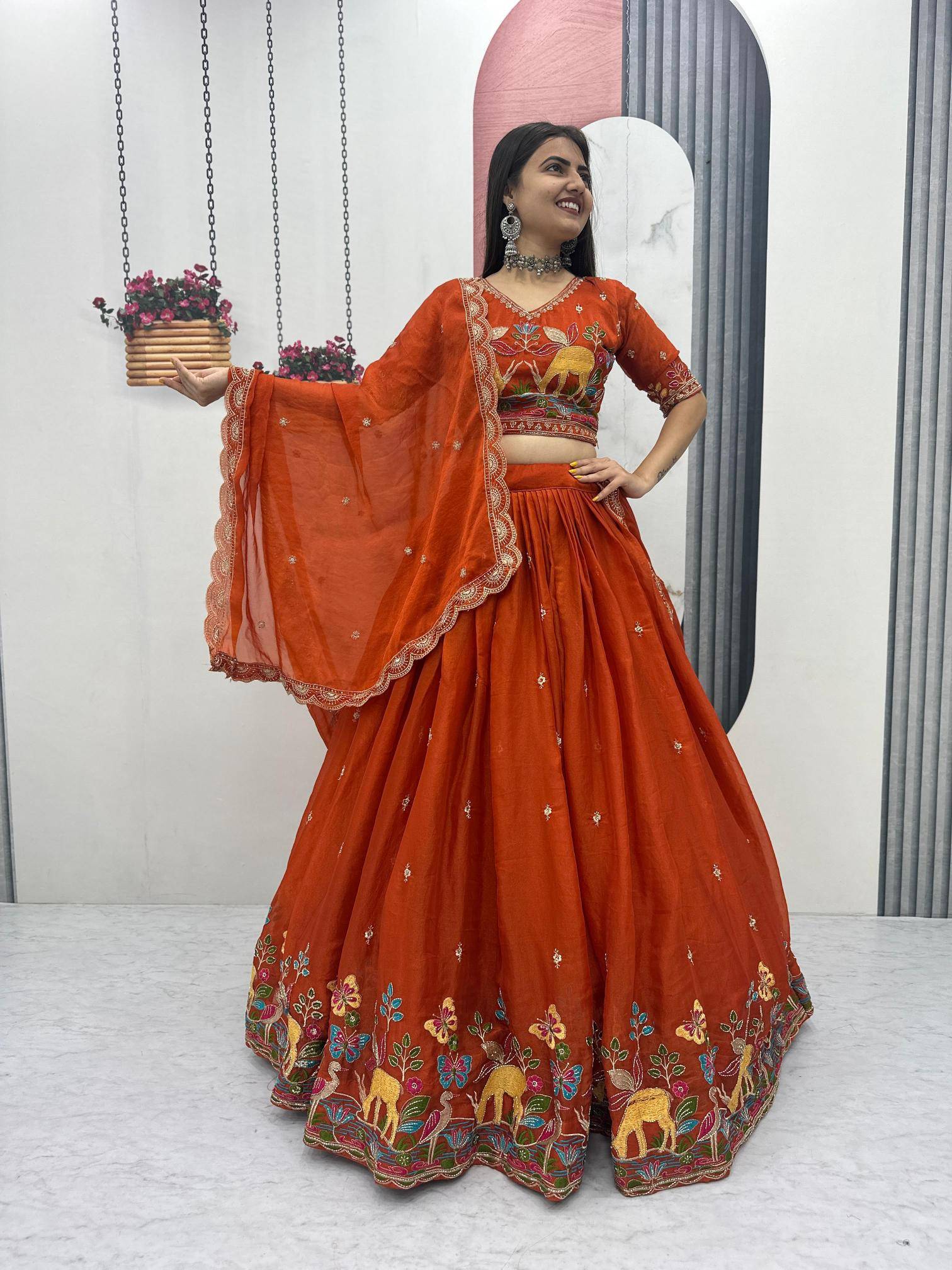 Tapi-303 shimar Orange Embroidered lehenga choli wholesalers in Gujarat