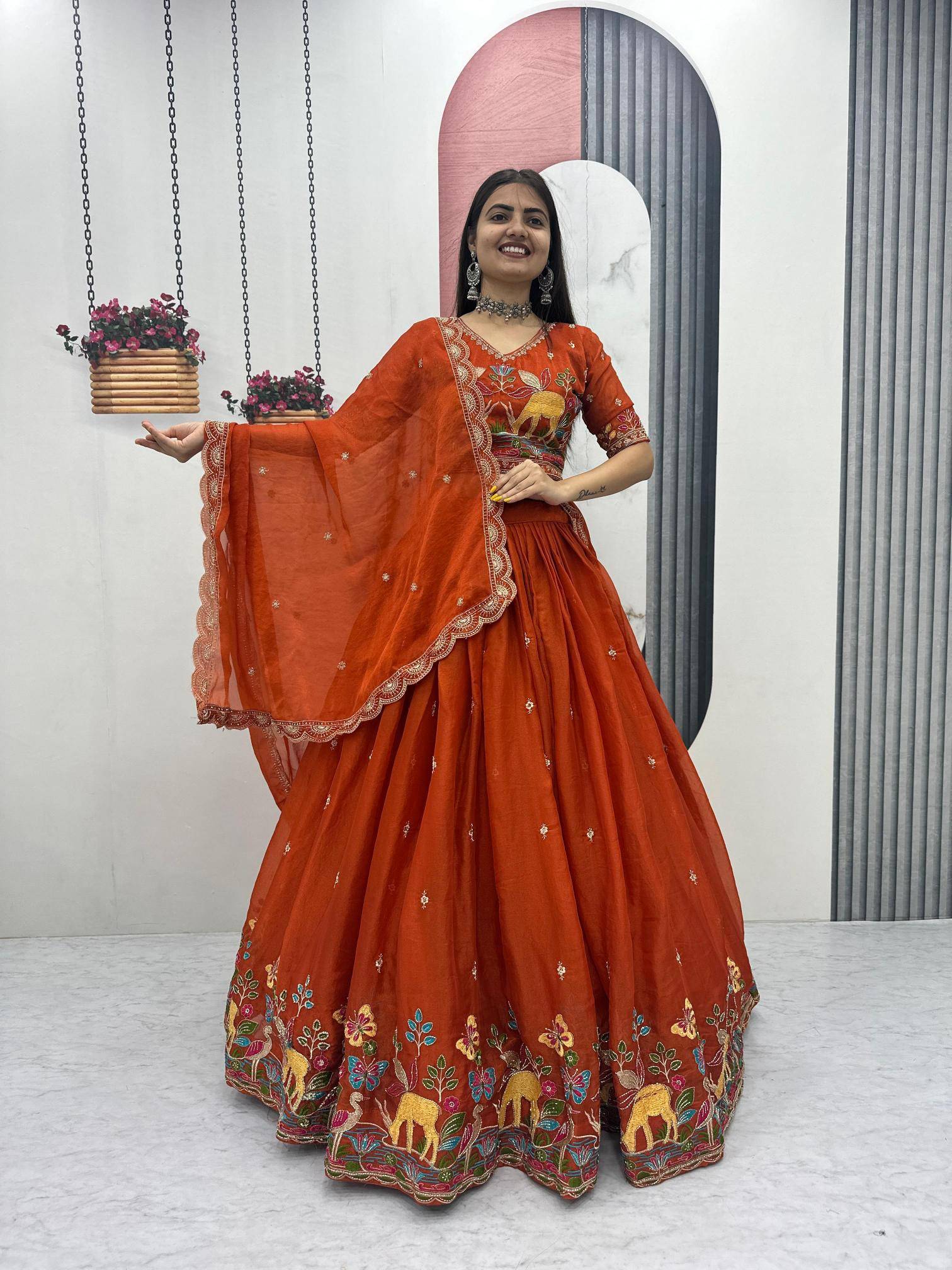 Tapi-303 shimar Orange Embroidered lehenga choli wholesalers in Gujarat